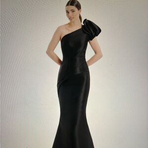 Alexander by Daymor black gown w/matching wrap.Worn once. Excellent condition.